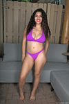 Young Latina girl Gabriela Lopez peels off her bikini for her first nude poses
