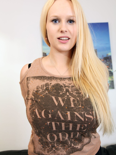 Buxom blonde Angel Wicky shows her amazing tits and big ass in a solo